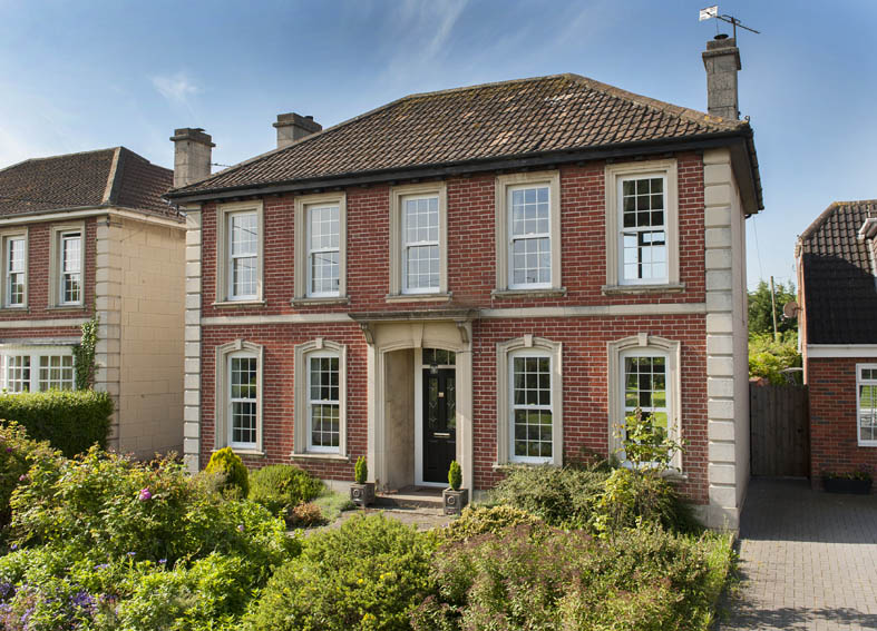 large house with sliding sash windows