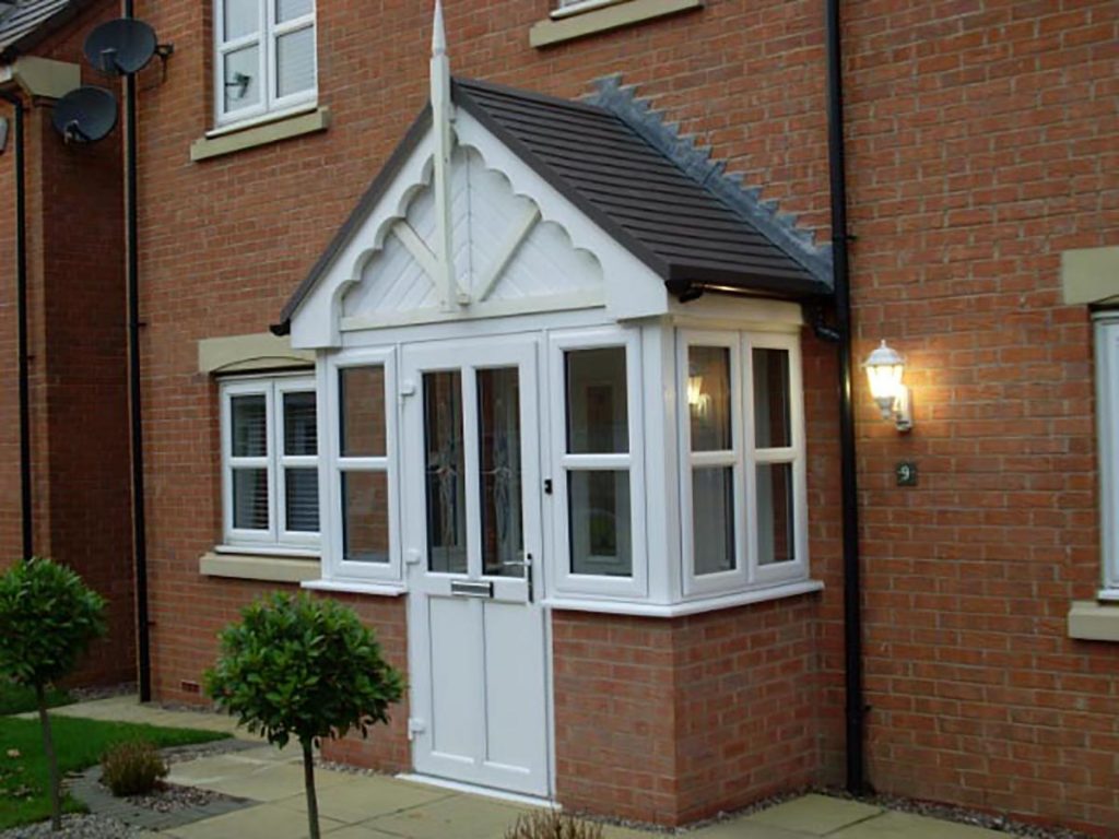 white upvc front door with porch
